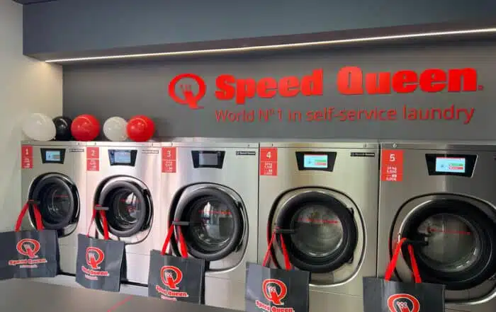 Speed Queen washer-extractors in a self-service laundry in Madrid.